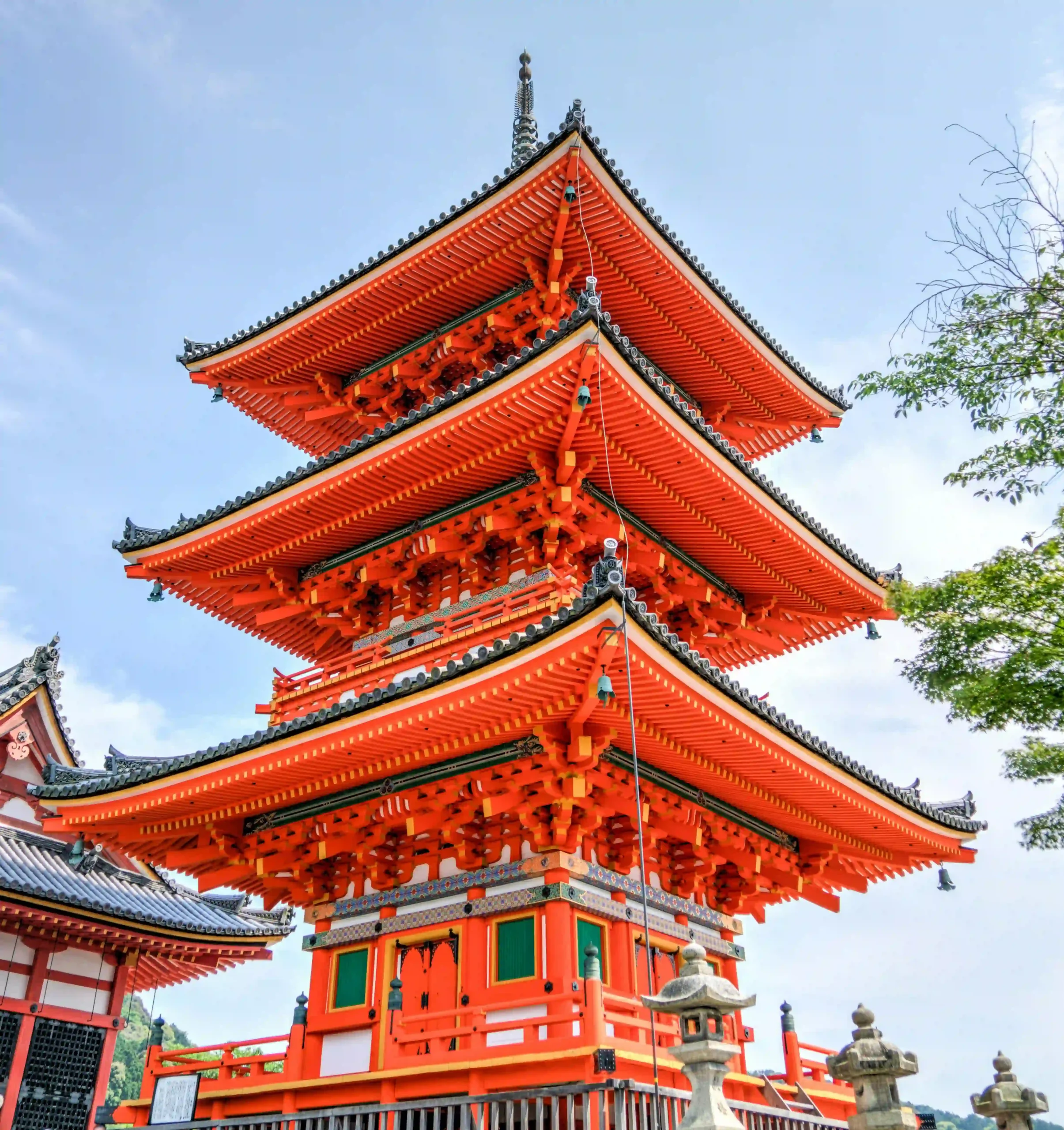 Vibrant red pagoda of Kiyomizu-dera Temple in Kyoto.