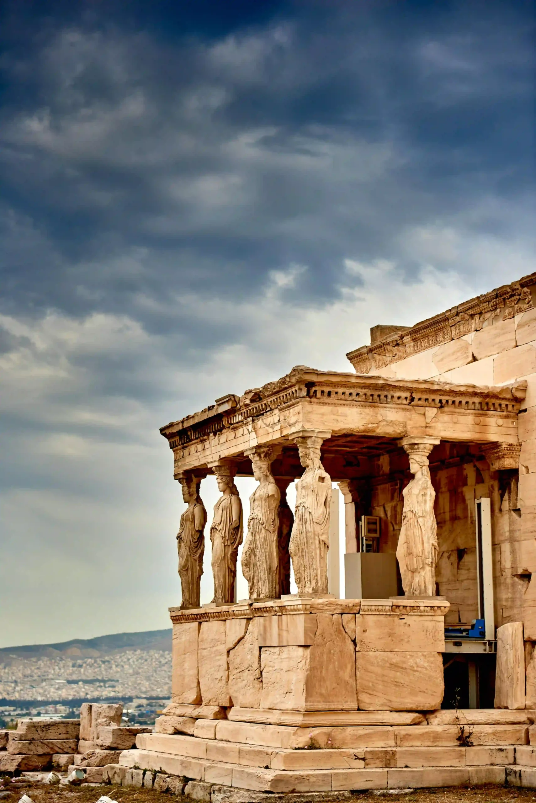 The ancient Parthenon temple at the Acropolis in Athens against a clear blue sky.