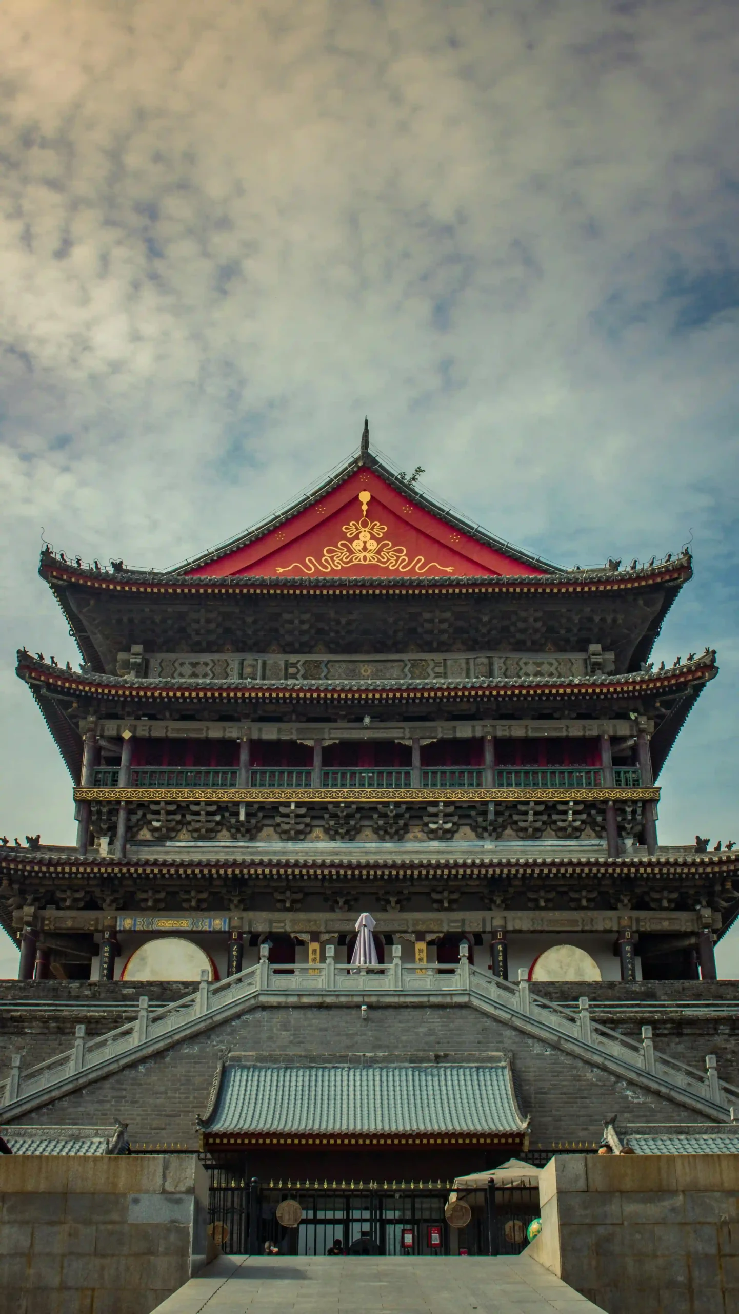 The historic Bell Tower in Xi'an, China, illuminated at dusk.