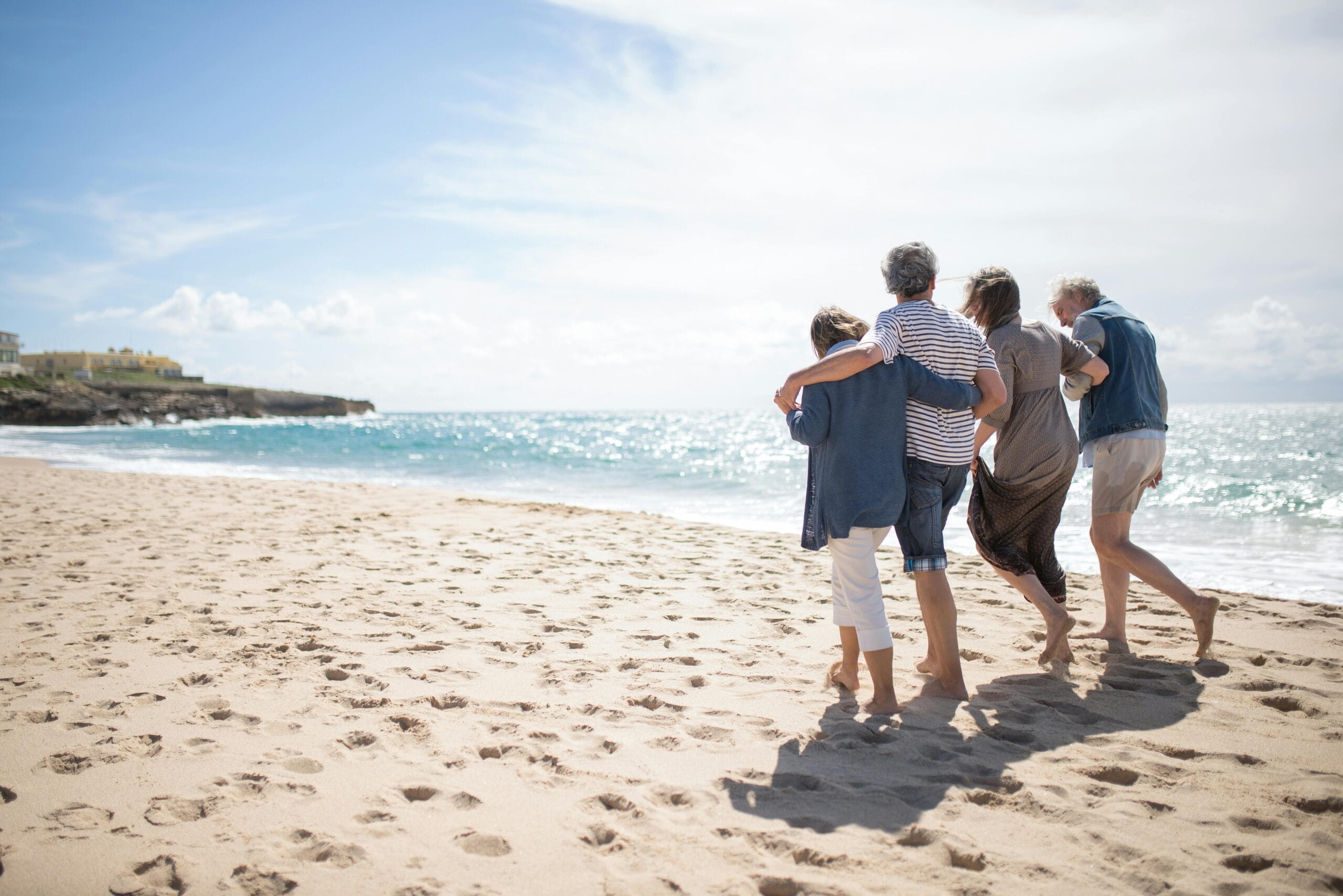 Family walking together on a beach