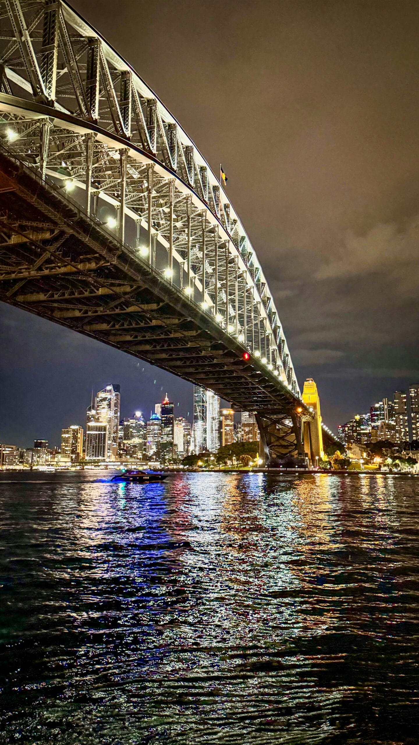 The iconic Sydney Opera House at night, representing vibrant city culture in Australia.